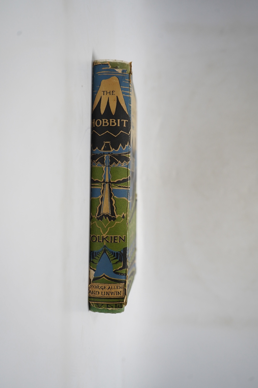 Tolkien J.R.R - The Hobbit, 2nd edition, 5th. impression, colour frontispiece, illustrations, map endpapers, top edge green, original green pictorial cloth, unclipped dust jacket, 8vo, George Allen & Unwin, London, 1951.
